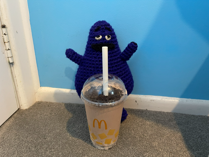 Grimace with a milkshake